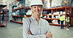 Happy senior woman, leadership and warehouse with arms crossed in professional storage management. Portrait of mature female person or team manager smile in inventory, supply chain or logistics