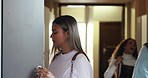 University, education and woman with bag in locker for class, lesson and learning at academy. College, school and female student with textbooks for studying, scholarship and knowledge in hallway