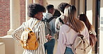 Students, group and college friends walking together for education, learning and break with backpack. Back of people at university school for conversation about scholarship, diversity and chat