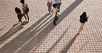 University, campus and walking with students, outdoor and college plaza in the morning. Above, group and young people with commute and travel on concrete for school, education and class at academy