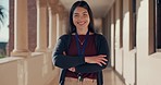 Education, teacher and crossed arms with smile on school ground for learning, knowledge and happiness outside. College, face and portrait of woman on campus at university for lecture and teaching
