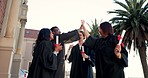 Happy people, applause and high five in graduation celebration for diploma, degree or certificate together at campus. Group of graduate students in success for team achievement, milestone or winning