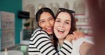 Face, selfie and happy girl friends in a restaurant with profile picture and social media. Bruch, smile and laughing young people together with bonding and photo for post in a cafe or coffee shop