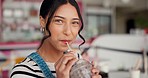 Happy, woman face and smoothie in a restaurant with healthy drink and smile in cafe. Fruit beverage, female person relax or milkshake in a coffee shop or diner with a portrait and drinking juice
