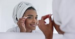 Woman, tweezers and eyebrows in mirror, beauty and bathroom for results, cosmetics and transformation for home. Girl, facial hair and thinking for change, wellness or dermatology in morning at house