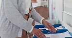 Paperwork, hands and teacher in classroom with student exam evaluation documents and reading material for learning. School, planning and sorting of accounting information on paper for children