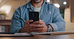 Man, phone and hands typing at night in online communication, networking or social media at office. Closeup of male person or employee texting, chatting or working late on mobile smartphone app