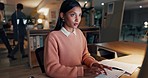 Woman, journalist and typing on computer at night in research, writing or project deadline at office. Female person or writer working late on schedule plan, tasks or documents on PC at workplace