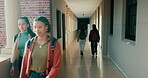 University, students and walking to class on campus for learning, knowledge and studying with timelapse. Education, college and group of people at school in hallway or corridor traveling fast  