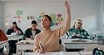 High school, girl and raised hand for question, classroom and education with talking for assessment. Student, test and learning with paper, book or thinking for exam, progress or growth with solution