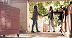 Handshake, carpenter and teamwork with people in garage for woodwork, manufacturing and agreement. Thank you, partnership and hello with men in workshop at home for welcome, product and renovation