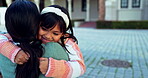 Mother, happy kid and hug at school outdoor for care, love and bonding together. Mom, child smile and embrace student for support, trust and welcome greeting after learning, education and studying