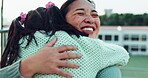 Mom smile, kid and hug at school outdoor for care, love and bonding together. Mother, happy child and embrace student for support, trust or welcome greeting after learning education at kindergarten