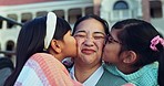 Kiss, face and teacher with children in school for education, learning and outdoor fun together on playground. Smile, portrait and kids or students hug woman teaching in montessori kindergarten