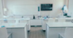 Science, classroom and blur with empty room of laboratory for learning, chemistry and technology. Medicine, education and research with interior of school for college, medical and experiment