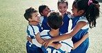 Hug, above and children on a field for soccer success, celebration or excited about a goal. Smile, group and kids with a huddle or win with teamwork, fitness or achievement together in football