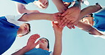 Kids, soccer and hands together with team, sports and mission with young athlete group outdoor and low angle. People, competition and football player with support, fitness and huddle before game