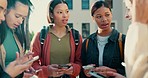 Girl friends, phone and circle at campus, story or gossip with talk with high school kids on app. Young gen z students, smartphone and chat in huddle for social network with connection in Los Angeles