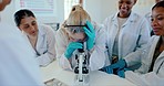 School, science and students in laboratory with microscope for learning, lesson and education. Chemistry, microbiology and girl with equipment for sample study, analysis and research at university