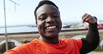 African man, fitness and video call with smile, face and flex muscle with talk, training or show location on vlog. Runner guy, influencer and hello with live streaming, exercise and workout by port