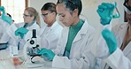 University, science and students in laboratory with microscope for learning, lesson and practical. Chemistry, microbiology and girl with equipment for sample study, education and research at school