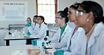 Laboratory, students listening and school for research, future scientist class on college table. Lecture, science and education for university and medical analysis of learning and studying group