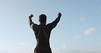 Man, fitness and fist pump on mockup in celebration, winning or sports achievement on sky background. Rear view of excited male person or athlete in success, victory or goals in exercise or workout