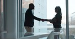 Business people, handshake and partnership in office with silhouette of b2b meeting, collaboration or support for project. Businessman, shaking hands and thank you for contract, deal or work success