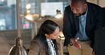 Computer, feedback and a business woman with her mentor in an office at night for work on a project. Human resources, management and documents with a corporate man talking to an employee for training