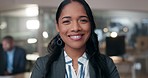 Happy, face and a business woman in an office at night for corporate work, overtime or a deadline. Smile, headshot or portrait of a young employee working late at a company with confidence in job