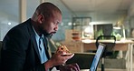 Pizza, night and professional black man on a laptop in the office doing research for a financial project deadline. Fast food, technology and African male accountant eating a dinner meal and working.