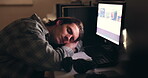 Sleeping, student and tired man at desk, stress and relax at night on computer. Fatigue, bored and person rest on table, burnout or exhausted in learning, education or insomnia to study in university