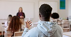 Back, education and a student talking in a classroom, asking his teacher a question for learning or knowledge. Study, college or university with a male teen chatting to his professor in class