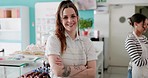 Bakery, happy and face of woman in cafe for small business, restaurant and startup career. Professional, coffee shop and portrait of waitress with crossed arms for sweet foods, pastry and service