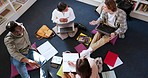 Students in library, people study together and learning, education and discussion with books and technology. Top view, communication with young men and women, scholarship and academic group work