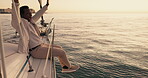 Travel, freedom and sunset with black man on yacht for sailing, adventure and summer vacation. Happy, journey and tourism with person relax on deck of boat for tropical, cruise and seaside holiday