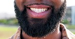 Smile, happy and closeup of mouth of man in city for happiness, joy and facial expression. Dental care, oral hygiene and zoom of person with beard for teeth whitening for confidence, pride and health