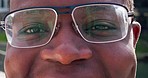Closeup, eyes and man with glasses, face and optometry with clear vision, retina and frames. Portrait, zoom or person with eyewear, looking or see with wellness, sight or human with health or optical