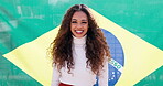 Woman, face and smile in Brazil, flag and pride in country, happiness and beauty with travel, vacation and symbol. Patriotic, Brazilian citizen or portrait with nationality, confidence or positivity 