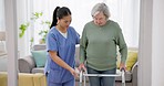 Nursing home, support and senior woman with walker in living room with nurse for balance, support or rehabilitation. Homecare, help and old lady patient with a disability, caregiver or physiotherapy