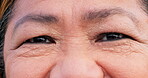 Eyes, vision and wrinkles with a senior woman closeup, looking happy at life during retirement. Portrait, inspiration and optimism with an elderly person feeling peace about freedom of mindset