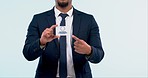 Business man, card and hand with corporate conference pass for seminar and workshop in a studio. Sales, promo and advertising for employee trade show with a professional in suit with blue background