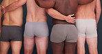 Body positivity, diversity and men in underwear with community, confidence and back of plus size people in studio. Friends, group and male beauty on grey background with solidarity and pride together