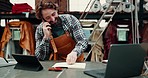 Phone call, leather workshop and craftsman take order, writing in book and listening. Smartphone, tannery factory and happy tailor talking for textile production, manufacturing and small business.