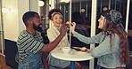 Friends, cake and celebration in coffee shop, happy and comic toast with diversity, eating and conversation. African man, women or students with dessert, cafe and cheers for food, sweets and tea cup