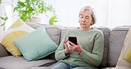 Senior woman, sofa and typing on smartphone, scroll social media and reading mobile news at home. Cellphone, elderly lady and search website, download digital app and chat notification in living room