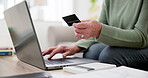 Woman hands, credit card and laptop in online shopping, home investment and banking or pension funding on sofa. Senior or elderly person typing on computer for payment plan, e commerce or transaction