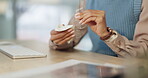 Hands, woman and cleaning glasses in office with fabric tissue for lens protection, sight and eye care. Closeup, worker and microfiber cloth to wipe dirt on frames, eyewear and dust for clear vision 