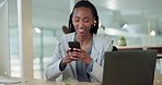 Black woman, smartphone and typing at desk in office for social network, mobile website and internet contact. Happy worker search cellphone, reading news app and information for business connection