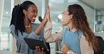 Business women, tablet and team high five to celebrate win in office with collaboration. Achievement, technology and people together for success, report and feedback with results on website review
